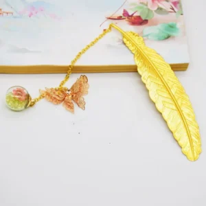 S072ffdefe25f40e4b99d9ed6f1e3c08bC.webp Retro Bookmark Feather Butterfly Creative Metal Bookmarks Stationery Gift Metal Feather Bookmark In Gift Box Packaging