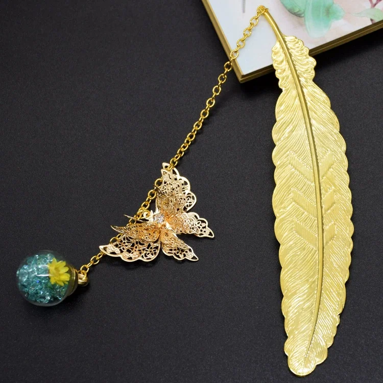 S095c36265d0949dcad50c61ecbebe68cP.webp Retro Bookmark Feather Butterfly Creative Metal Bookmarks Stationery Gift Metal Feather Bookmark In Gift Box Packaging