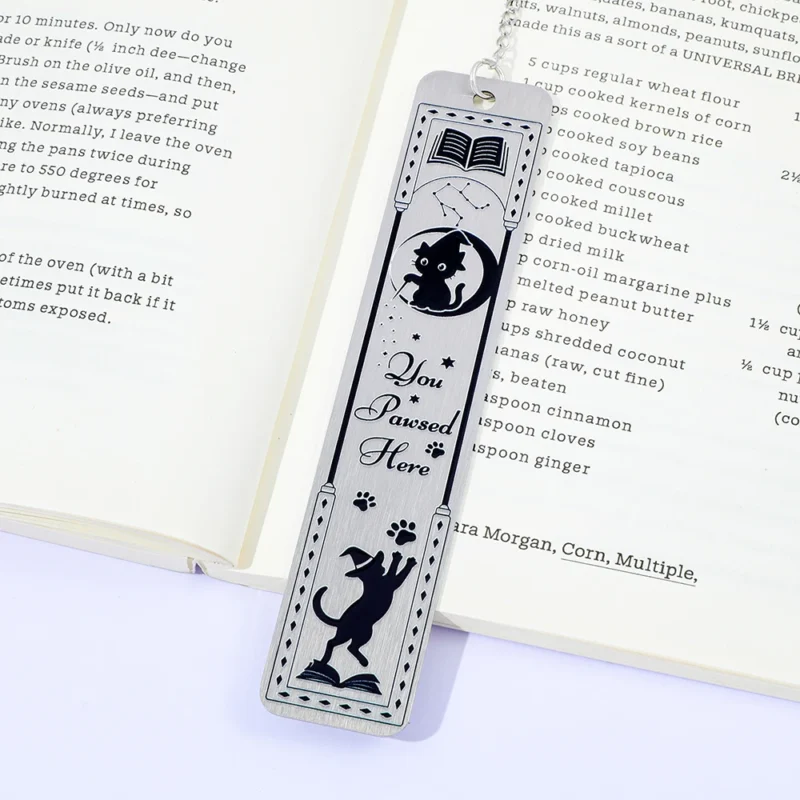 Cat themed metal bookmark with hanging accessories, a great reading assistant for poop scoopers and cute fans.