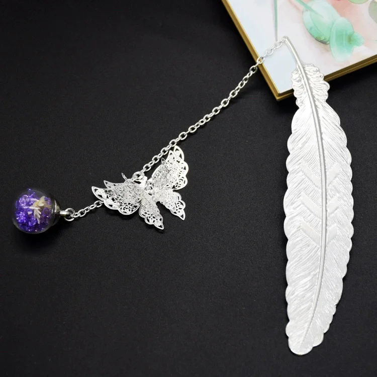 S2d5fa5cce64441e084e5d72381b7cc23J.webp Retro Bookmark Feather Butterfly Creative Metal Bookmarks Stationery Gift Metal Feather Bookmark In Gift Box Packaging